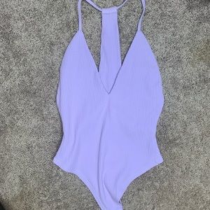Lilac onesie with ripped design